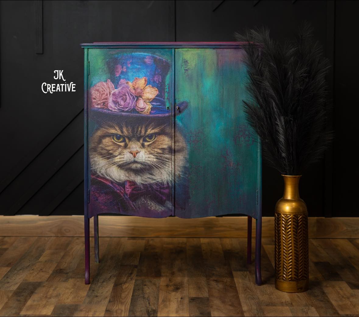 Close-up of crushed, textured tissue paper with vibrant pink, purple, and teal floral patterns visible through