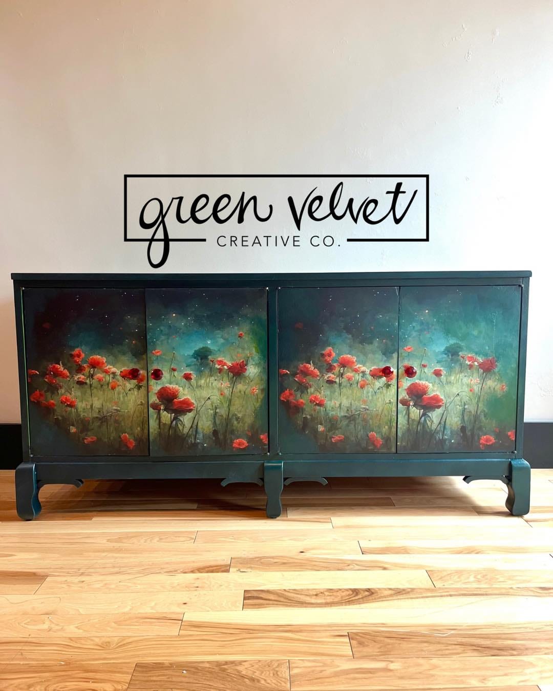 Close-up of vibrant red poppies and green foliage on decoupage tissue paper, highlighting detailed floral print and textured