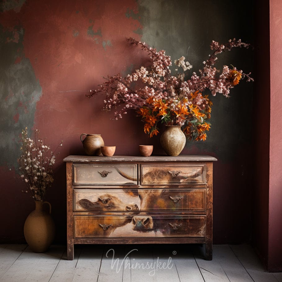 Close-up of vibrant, torn tissue paper edges revealing intricate patterns and layered textures in bright floral colors.