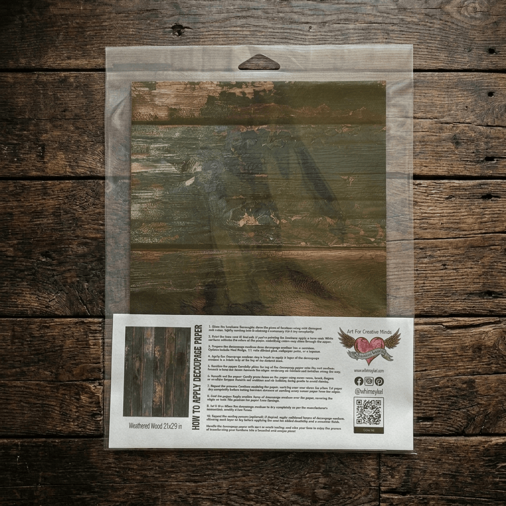 A package of decoupage tissue paper. The product includes a clear plastic bag containing the design Weathered Wood with instructions.