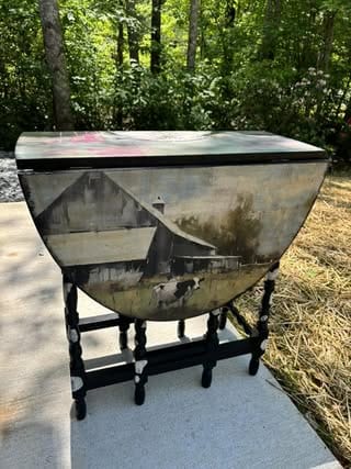 Close-up of the intricate rice decoupage paper pattern with visible textured fibers and vibrant Heartland design details