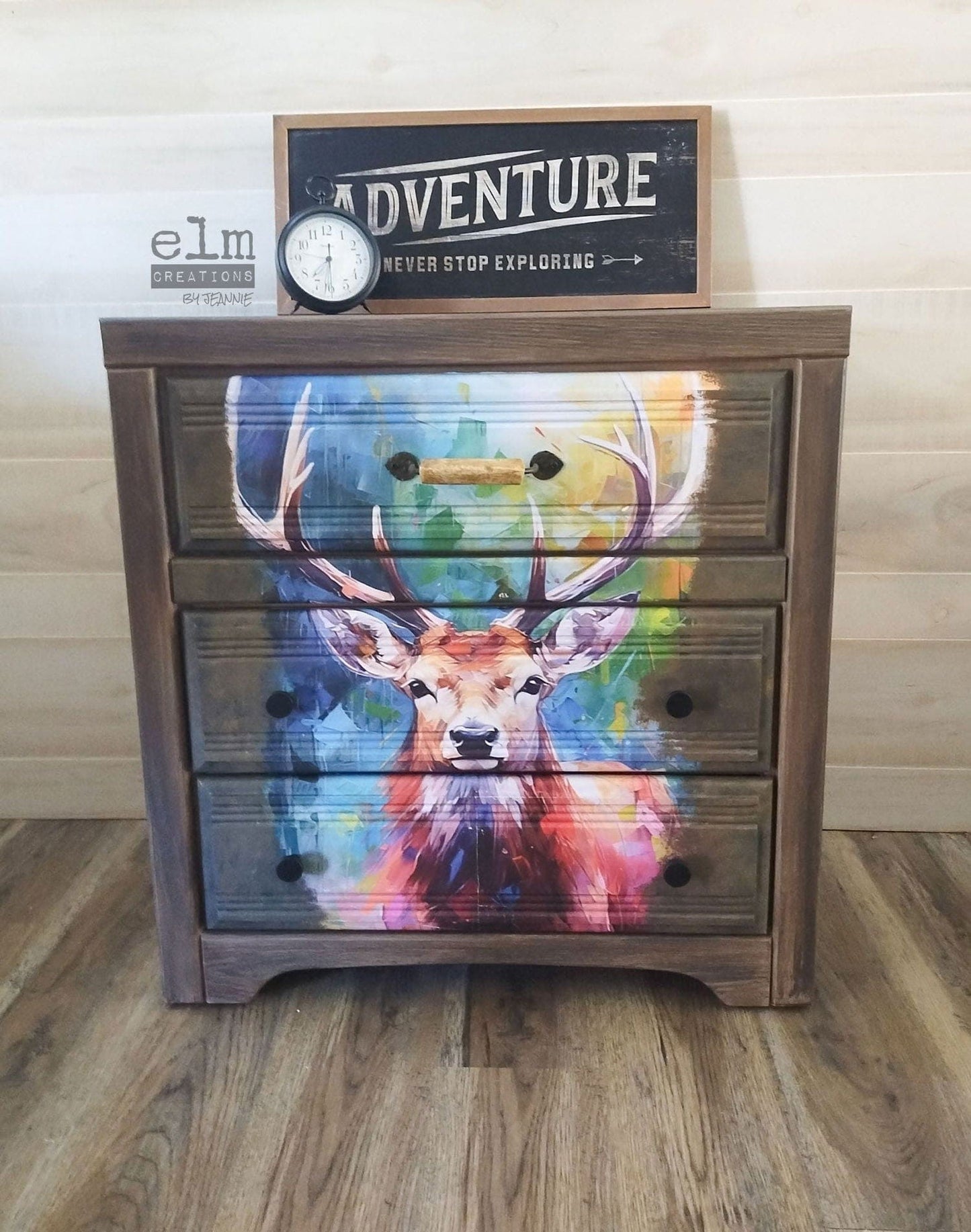 Close-up of the decoupage paper's textured surface with intricate script and subtle color variations visible at a slight