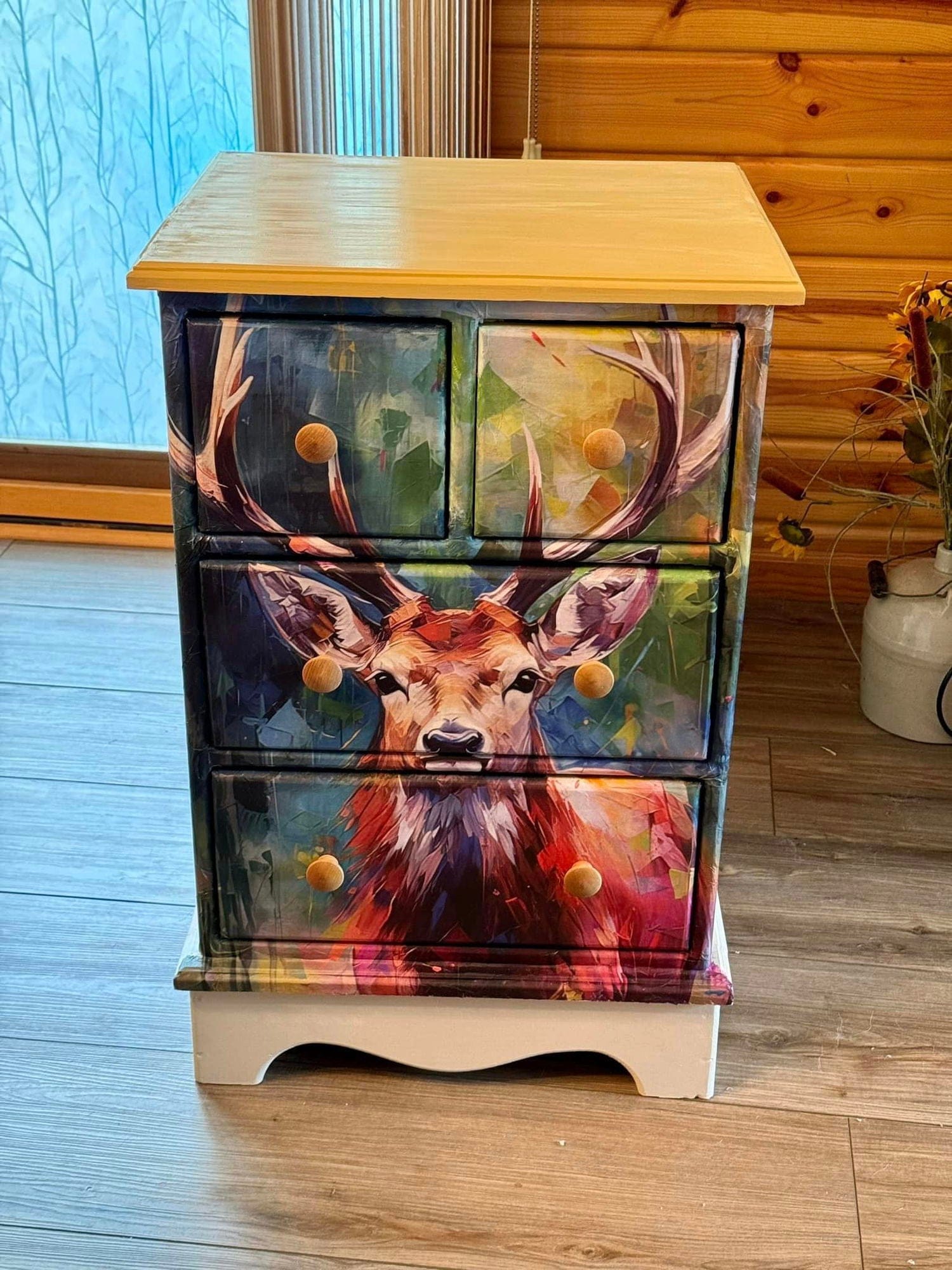 Close-up of textured decoupage paper featuring a distressed cream background with gold accents and intricate paper fibers