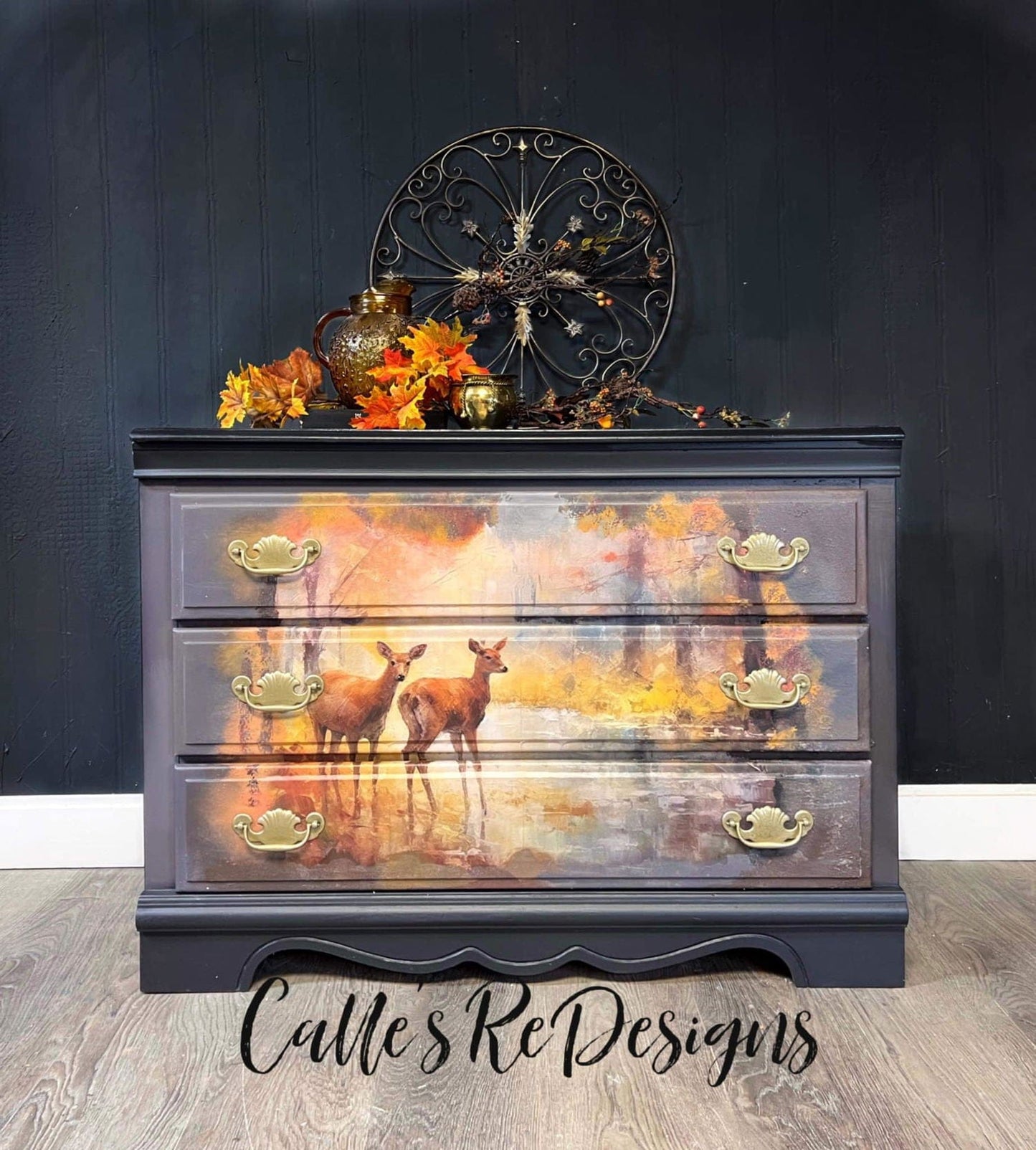 Close-up of decoupage paper’s detailed woodland leaf pattern with textured paper fibers and vibrant earthy tones